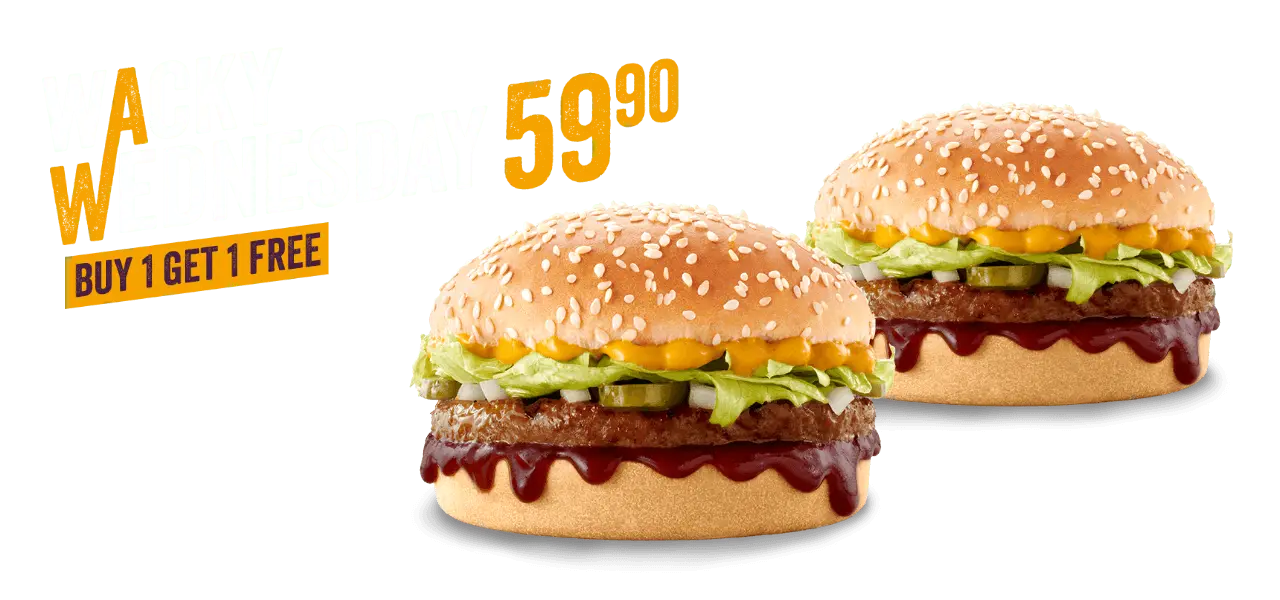 Two burgers on a grey surface against a purple background